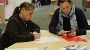 Photo of adult learner Julie, with tutor